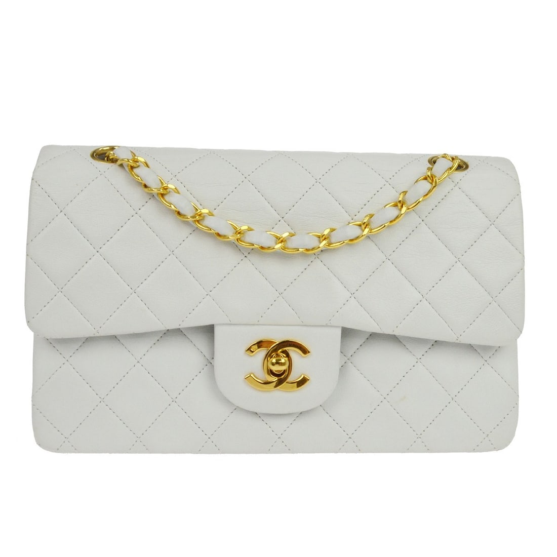 CHANEL Classic Double Flap White Lambskin Shoulder Bag: CHANEL Classic Double Flap White Lambskin Shoulder Bag This Chanel Classic Double Flap Shoulder Bag features a white leather exterior with a signature matelasse pattern and a flap turnlock closure acc