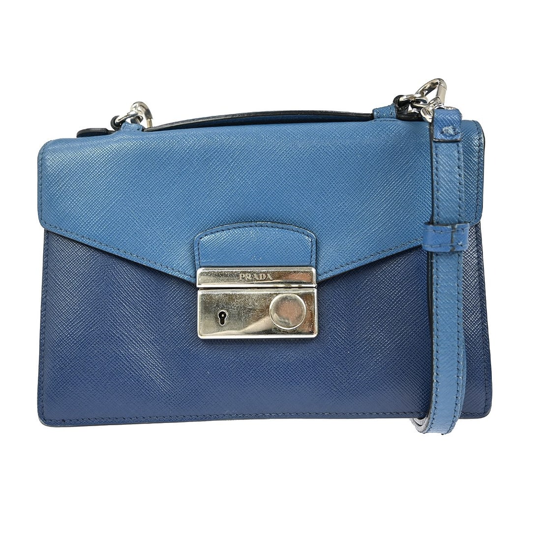 Prada Blue Leather Mini Vintage Shoulder Bag with Buckle Closure: Prada Blue Leather Mini Vintage Shoulder Bag with Buckle Closure Introducing the Prada Mini Shoulder Bag, a stunning accessory crafted from premium blue leather. This elegant bag features a buckle clo