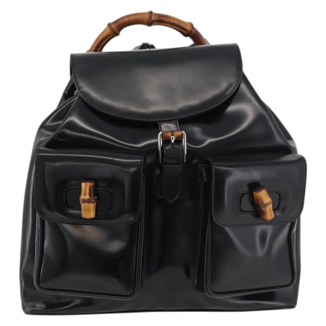 Gucci Black Patent Leather Vintage Bamboo Backpack Italy: Gucci Black Patent Leather Vintage Bamboo Backpack Italy This Gucci Vintage Bamboo Backpack is crafted from black patent leather and features the iconic bamboo handle design. Designed for women, it of
