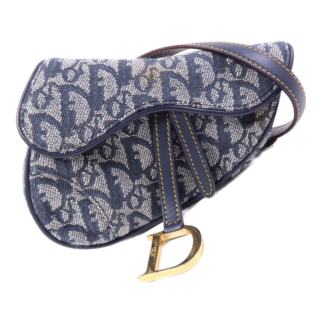Dior Mini Saddle Blue Canvas Shoulder Bag with Gold Hardware: Dior Mini Saddle Blue Canvas Shoulder Bag with Gold Hardware This vintage Christian Dior mini saddle belt bag is crafted from blue canvas and features gold-tone hardware. Designed as a shoulder bag, i