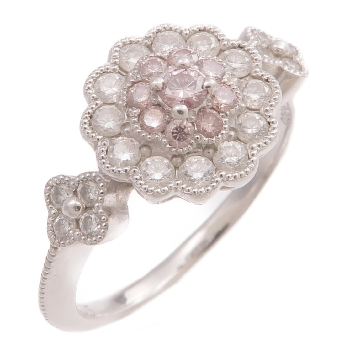Pink Diamond Ring in PT900 Platinum Size 6.25: Pink Diamond Ring in PT900 Platinum Size 6.25 This elegant ring features a pink diamond as the main stone, set in Pt900 platinum. The ring is a US size 6.25 and displays a refined pink color theme. It