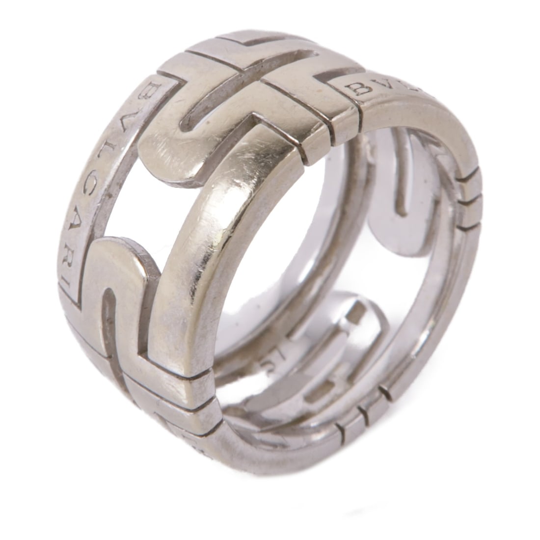 BVLGARI Parentesi 18K White Gold Unisex Ring Size 7.5: BVLGARI Parentesi 18K White Gold Unisex Ring Size 7.5 This BVLGARI Parentesi ring is crafted from 18K white gold and features a sleek, silver-tone design. Designed for a unisex fit, the ring is size 7