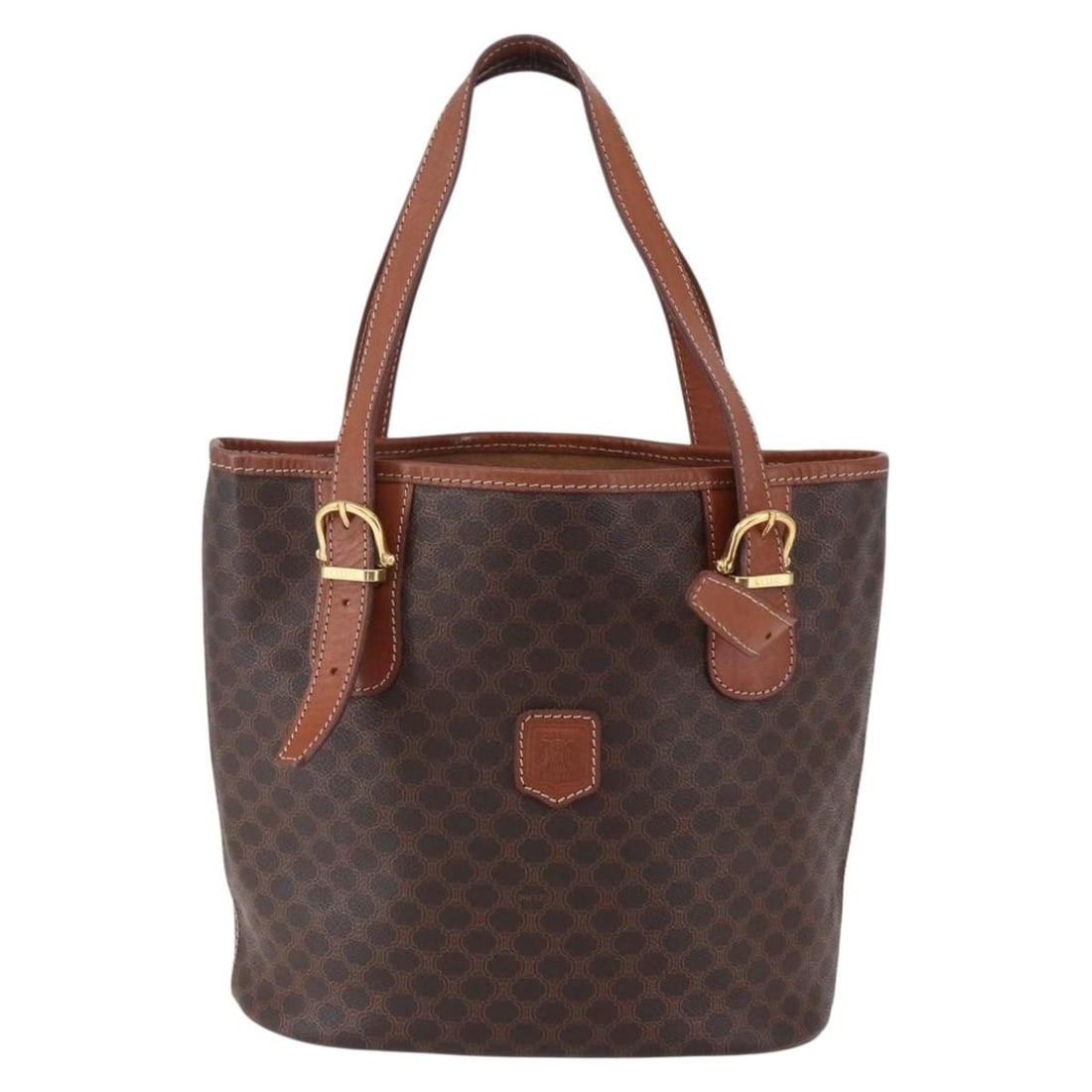Brown Canvas Tote Bag Celine Vintage Macadam 25cm by 24cm by 12cm: Brown Canvas Tote Bag Celine Vintage Macadam 25cm by 24cm by 12cm This pre-owned Celine vintage Macadam tote bag is crafted from brown canvas and designed for women. It features metal fittings and lea