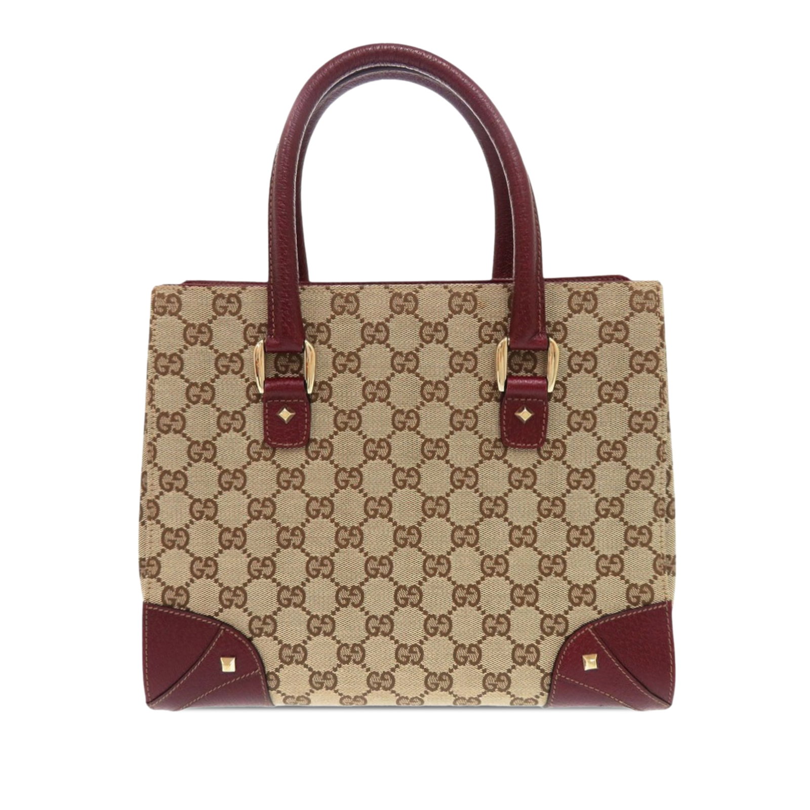 GG Canvas Nailhead Beige Tote with Studded Leather Trim by Gucci: GG Canvas Nailhead Beige Tote with Studded Leather Trim by Gucci This Gucci GG Canvas Nailhead Handbag features a beige canvas body with studded leather trim, rolled leather handles, an open top, and 