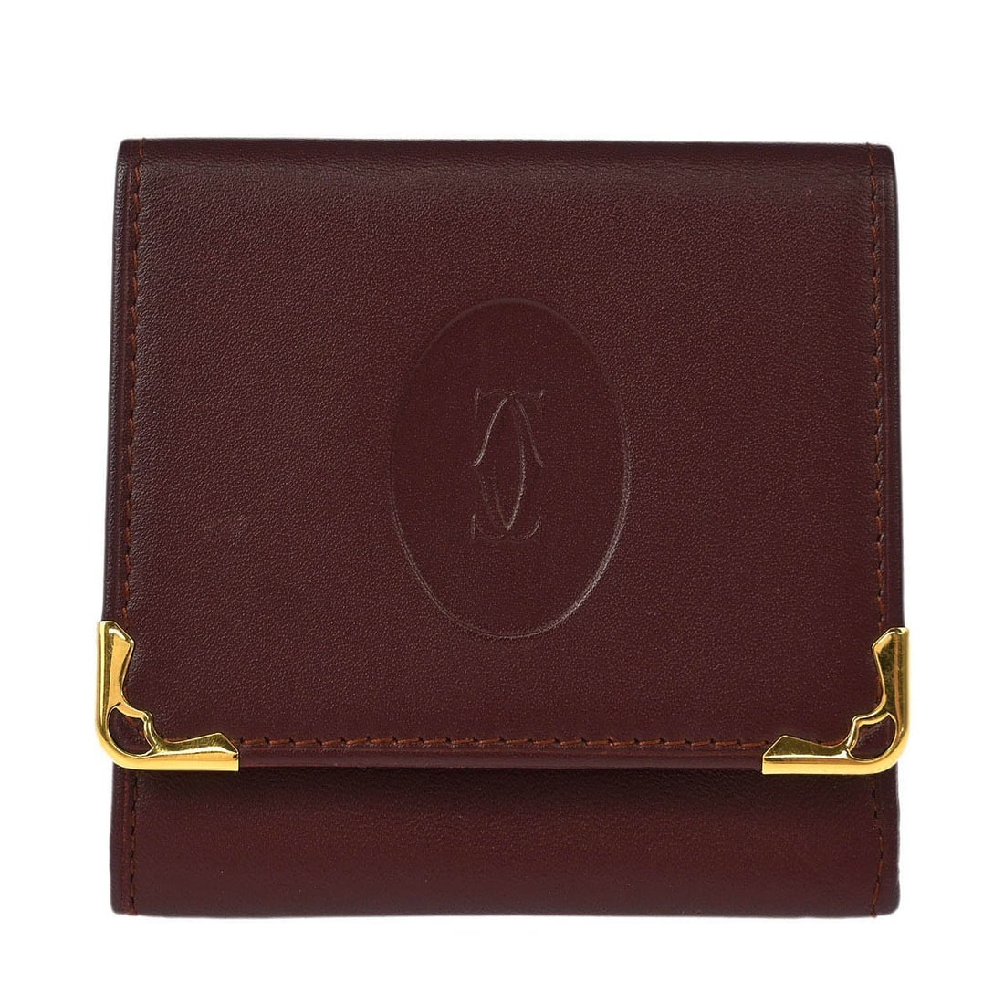 Vintage Cartier Leather Bordeaux Coin Wallet Purse: Vintage Cartier Leather Bordeaux Coin Wallet Purse This vintage Cartier coin purse wallet is crafted from bordeaux leather, offering a stylish and practical accessory for women. The wallet features a 