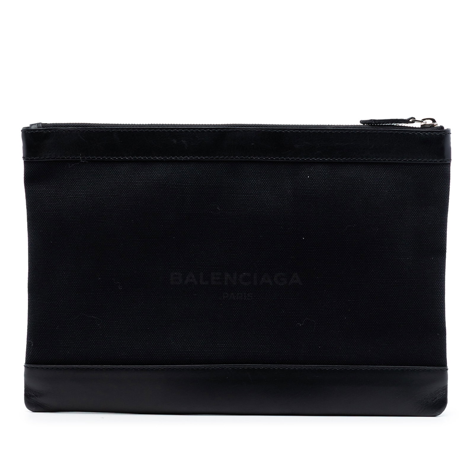 Balenciaga Navy Clip M Canvas Clutch with Leather Trim: Balenciaga Navy Clip M Canvas Clutch with Leather Trim This Balenciaga Canvas Navy Clip M Clutch features a canvas body accented with leather trim. It is designed with a top zip closure and includes a
