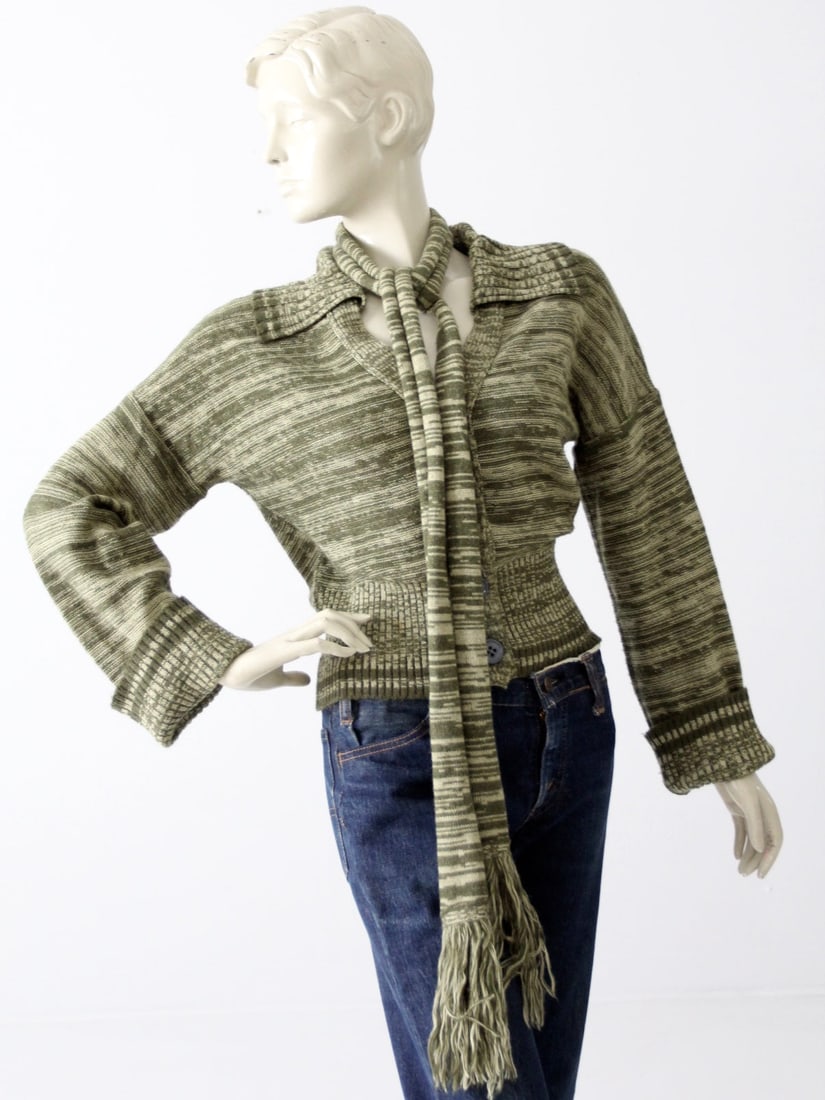 1970s Vintage Crissa Linea Cardigan Sweater with Scarf: 1970s Vintage Crissa Linea Cardigan Sweater with Scarf Step back into the 1970s with this vintage Italian cardigan sweater, featuring a matching skinny scarf for a complete bohemian look. Crafted from