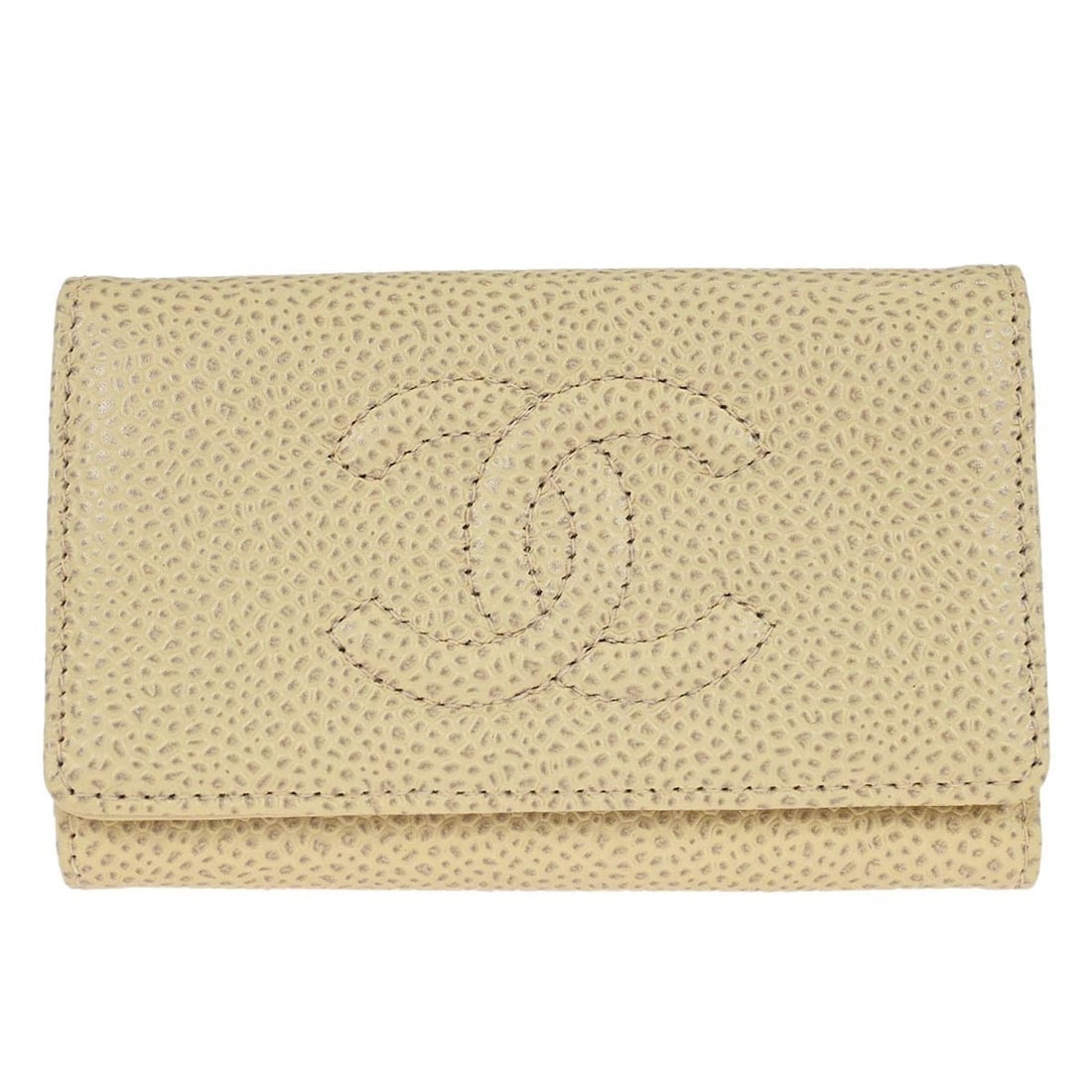 Off-white Calfskin Leather Key Case with Button Logo by Chanel: Off-white Calfskin Leather Key Case with Button Logo by Chanel This vintage Chanel key case is crafted from off-white leather and features a button logo accent. Made in France, it offers a compact and