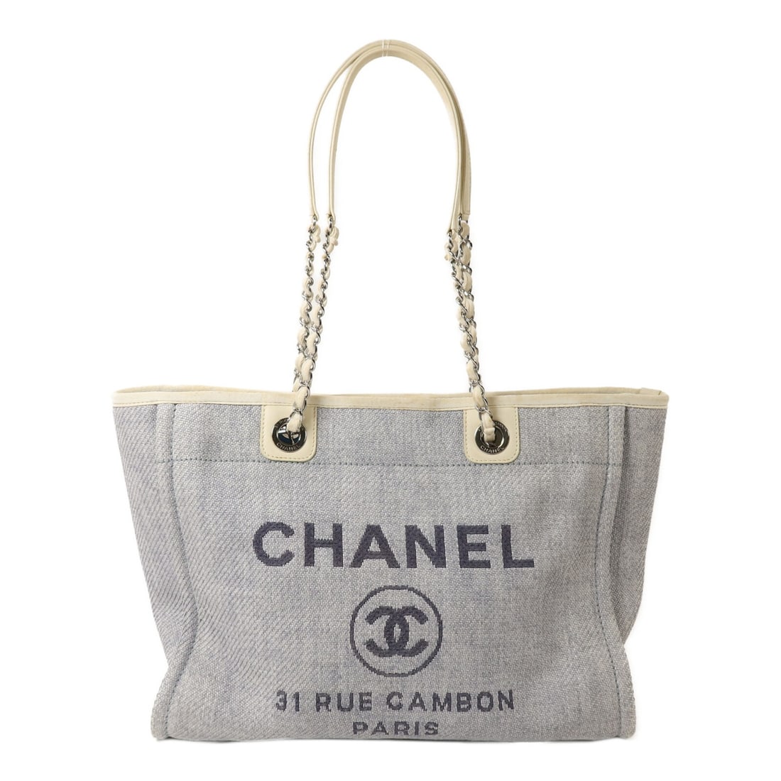 CHANEL Deauville Medium Blue White Raffia Tote Bag: CHANEL Deauville Medium Blue White Raffia Tote Bag This CHANEL Deauville Medium Tote Bag features a blue and white raffia exterior, complemented by silver-tone hardware. Designed for women, the tote o