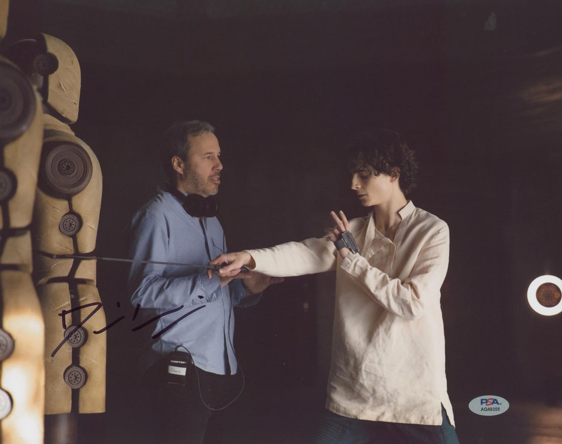 Denis Villeneuve signed Dune 11x14 horizontal photograph PSA DNA: Denis Villeneuve signed Dune 11x14 horizontal photograph PSA DNA This is an authentic 11x14 horizontal photograph personally signed by Denis Villeneuve, director of Dune. The autograph is verified by 