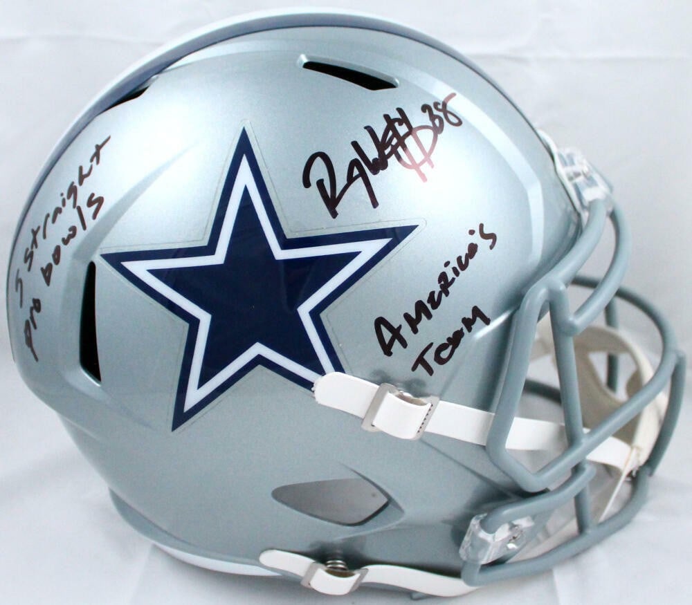 Dallas Cowboys Speed Helmet Signed by Roy Williams with Beckett Authentication: Dallas Cowboys Speed Helmet Signed by Roy Williams with Beckett Authentication This is a Dallas Cowboys full-size Speed helmet autographed by Roy Williams, featuring two inscriptions. The helmet is an