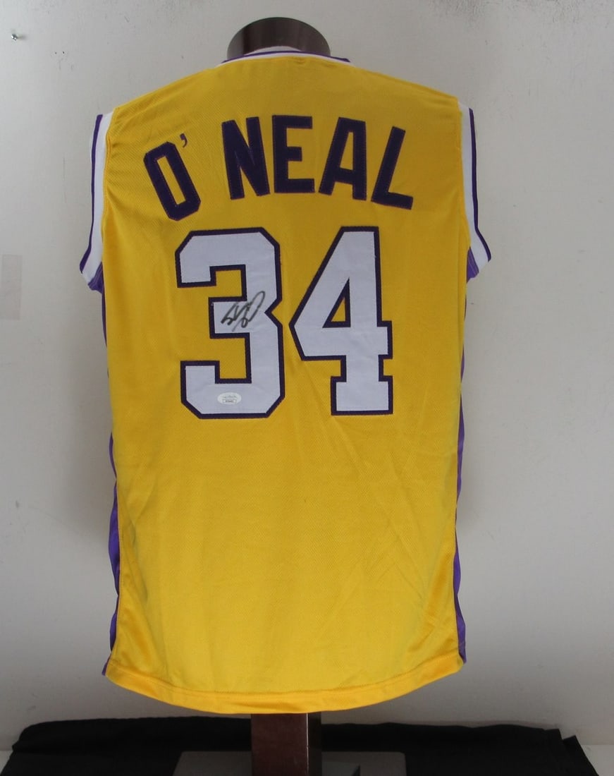 Shaquille O'Neal Autographed Lakers Jersey with JSA Authentication: Shaquille O'Neal Autographed Lakers Jersey with JSA Authentication This is a Shaquille O'Neal Hall of Fame signed and autographed Los Angeles Lakers gold custom basketball jersey, size XL. The jersey 