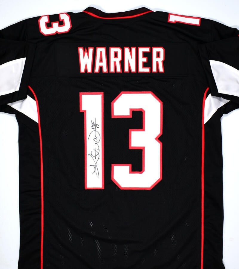 Kurt Warner Signed Black Pro Style Jersey HOF Beckett Authenticated: Kurt Warner Signed Black Pro Style Jersey HOF Beckett Authenticated This is an original black pro style jersey signed by NFL Hall of Famer Kurt Warner, a celebrated player of the Arizona Cardinals. Th