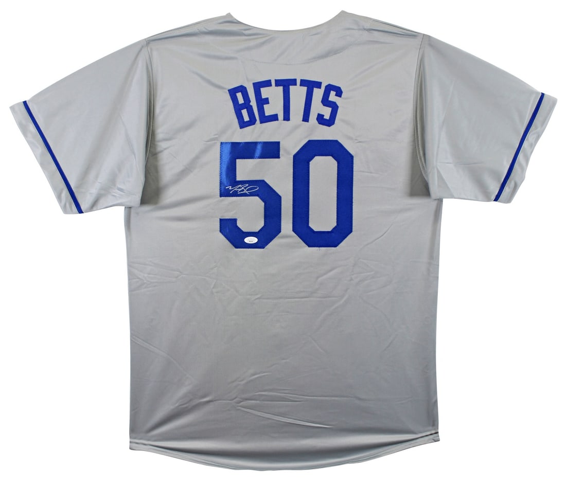 Mookie Betts Signed Grey Los Angeles Dodgers Jersey JSA Authenticated: Mookie Betts Signed Grey Los Angeles Dodgers Jersey JSA Authenticated This grey pro style jersey features the authentic signature of Mookie Betts from the Los Angeles Dodgers. The autograph is persona
