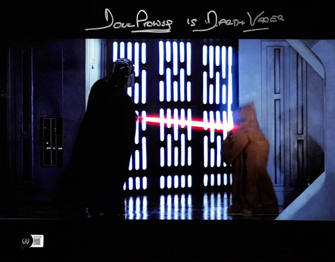 David Prowse Signed Darth Vader 11x14 Photo Beckett Certified: David Prowse Signed Darth Vader 11x14 Photo Beckett Certified Capture a piece of cinematic history with this autographed 11x14 color photograph featuring David Prowse as Darth Vader from Star Wars: A 