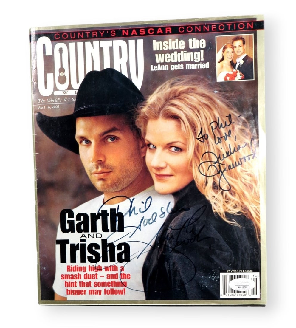 Garth Brooks Trisha Yearwood Dual Signed Magazine JSA Authenticated: Garth Brooks Trisha Yearwood Dual Signed Magazine JSA Authenticated This original magazine features the dual autographs of country music stars Garth Brooks and Trisha Yearwood, authenticated by James 