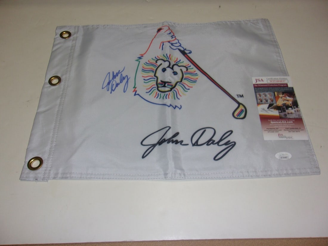 John Daly Signed Masters Golf Pin Flag With Grip It Rip It Inscription JSA COA: John Daly Signed Masters Golf Pin Flag With Grip It Rip It Inscription JSA COA This is a pre-owned Masters pin flag signed by golf legend John Daly, featuring the phrase "Grip It Rip It." The flag is 