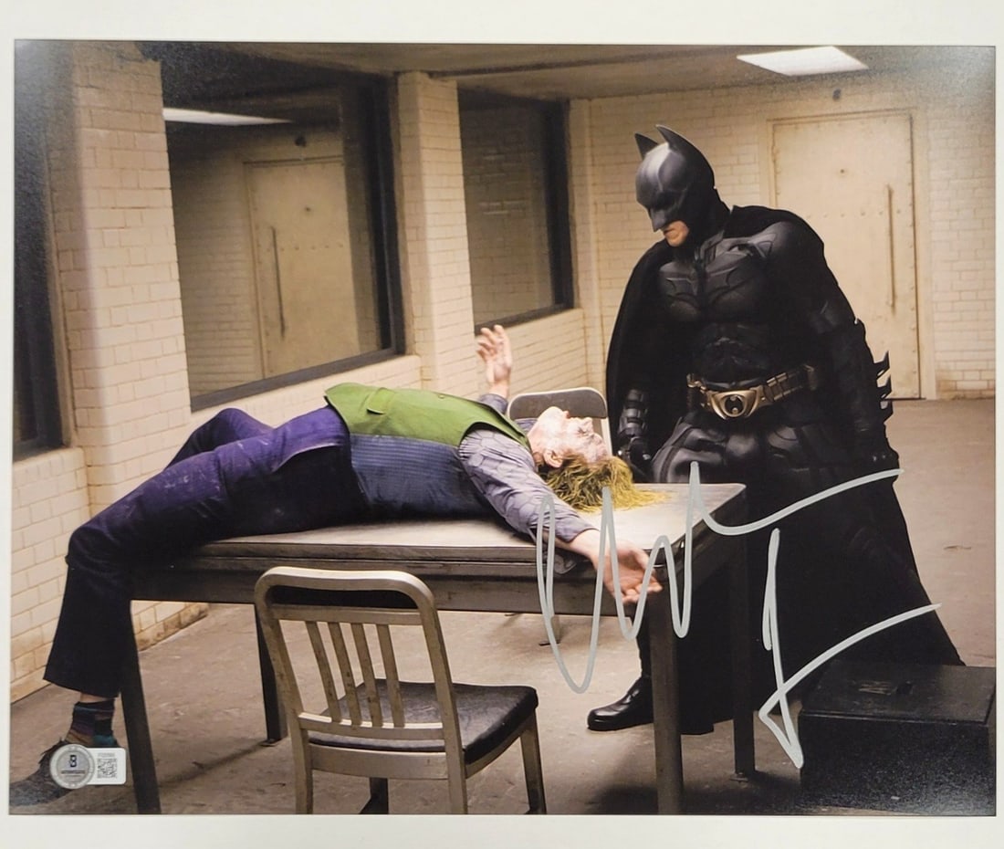 Christian Bale Signed 11x14 Batman Dark Knight Photo Beckett Authentic: Christian Bale Signed 11x14 Batman Dark Knight Photo Beckett Authentic This original 11x14 photograph from the movie The Dark Knight features a bold autograph by Christian Bale, who portrayed Batman. 