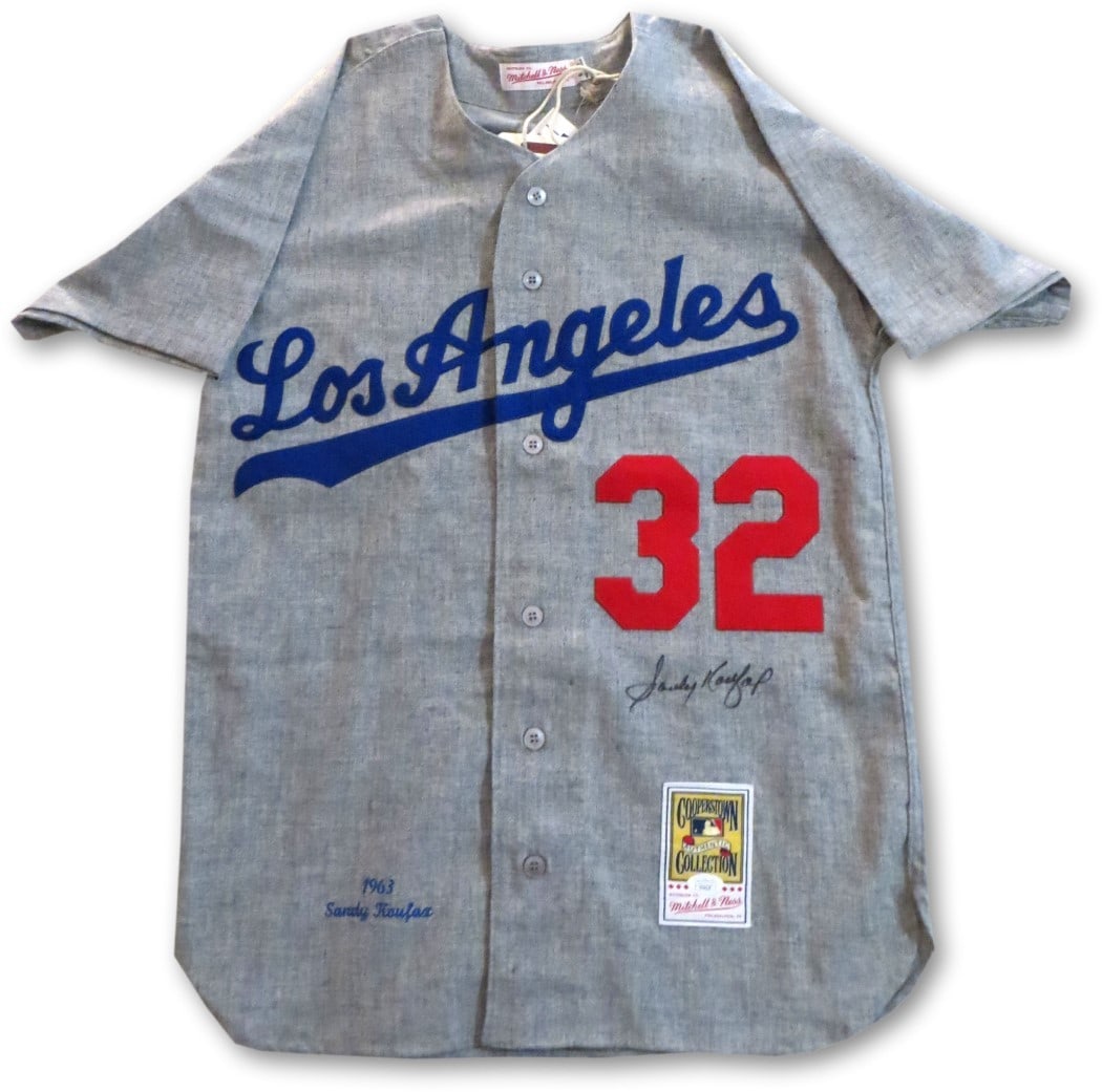 Sandy Koufax Signed Dodgers Mitchell & Ness Jersey JSA Authenticated: Sandy Koufax Signed Dodgers Mitchell & Ness Jersey JSA Authenticated This is a Sandy Koufax signed Mitchell & Ness jersey, featuring the iconic gray design of the Los Angeles Dodgers. It is an