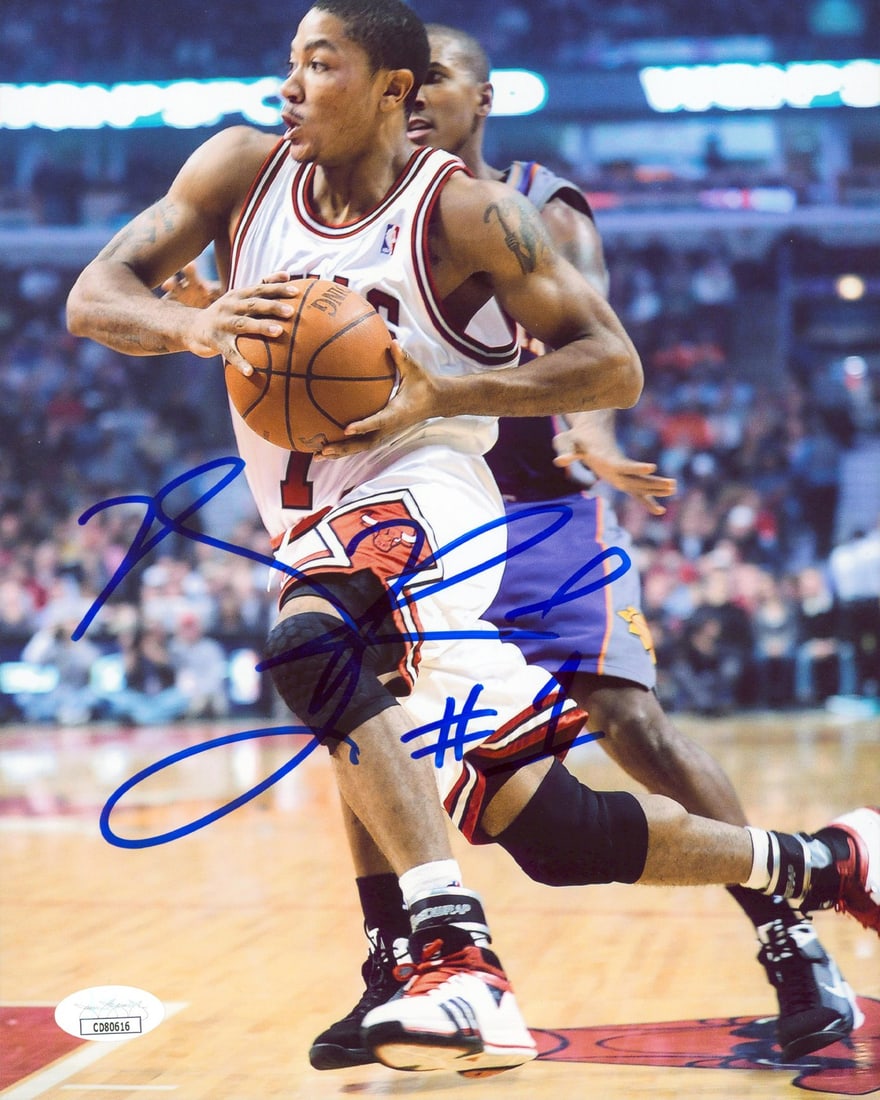 Derrick Rose Chicago Bulls signed 8x10 vertical photo JSA COA: Derrick Rose Chicago Bulls signed 8x10 vertical photo JSA COA This vertical 8x10 photo features the authentic signature of Derrick Rose from the Chicago Bulls. The photograph is an original item and h