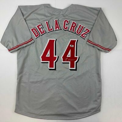 Elly De La Cruz signed Cincinnati grey custom jersey Beckett COA XL: Elly De La Cruz signed Cincinnati grey custom jersey Beckett COA XL This is a custom grey baseball jersey featuring the name and number of Elly De La Cruz, autographed and authenticated with a Beckett