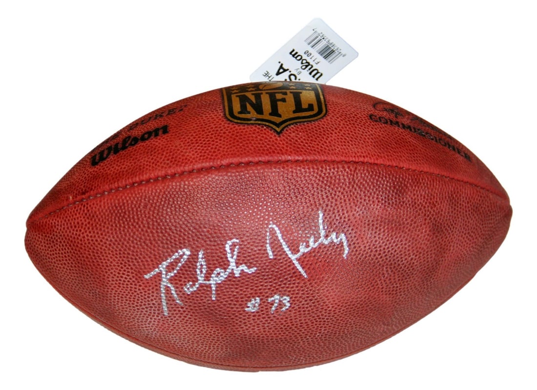 Dallas Cowboys NFL Ball Signed by Ralph Neely with Beckett Authentication: Dallas Cowboys NFL Ball Signed by Ralph Neely with Beckett Authentication This official NFL leather football has been autographed by Ralph Neely of the Dallas Cowboys. The signature is authenticated b