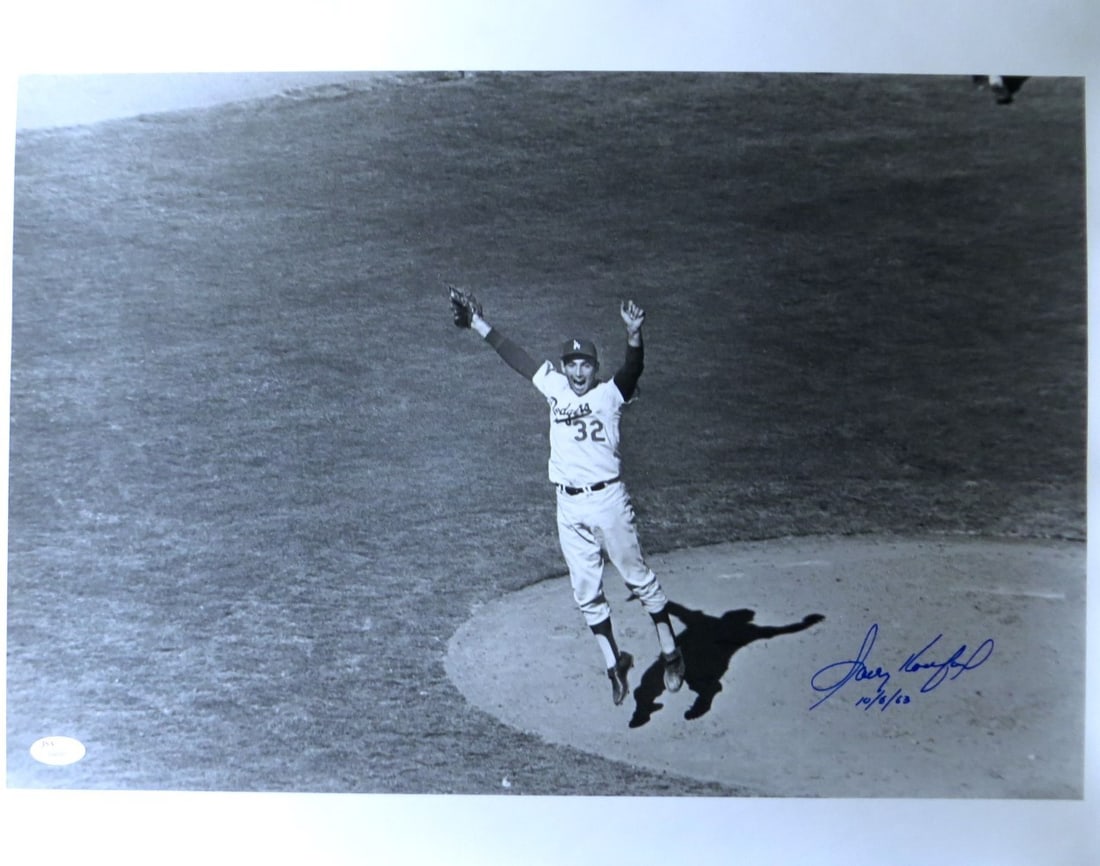 Sandy Koufax Signed 16X20 Photo Dodgers JSA Authenticated: Sandy Koufax Signed 16X20 Photo Dodgers JSA Authenticated This remarkable 16x20 photograph of Sandy Koufax showcases the legendary Los Angeles Dodgers pitcher during the 1963 World Series. The photo i