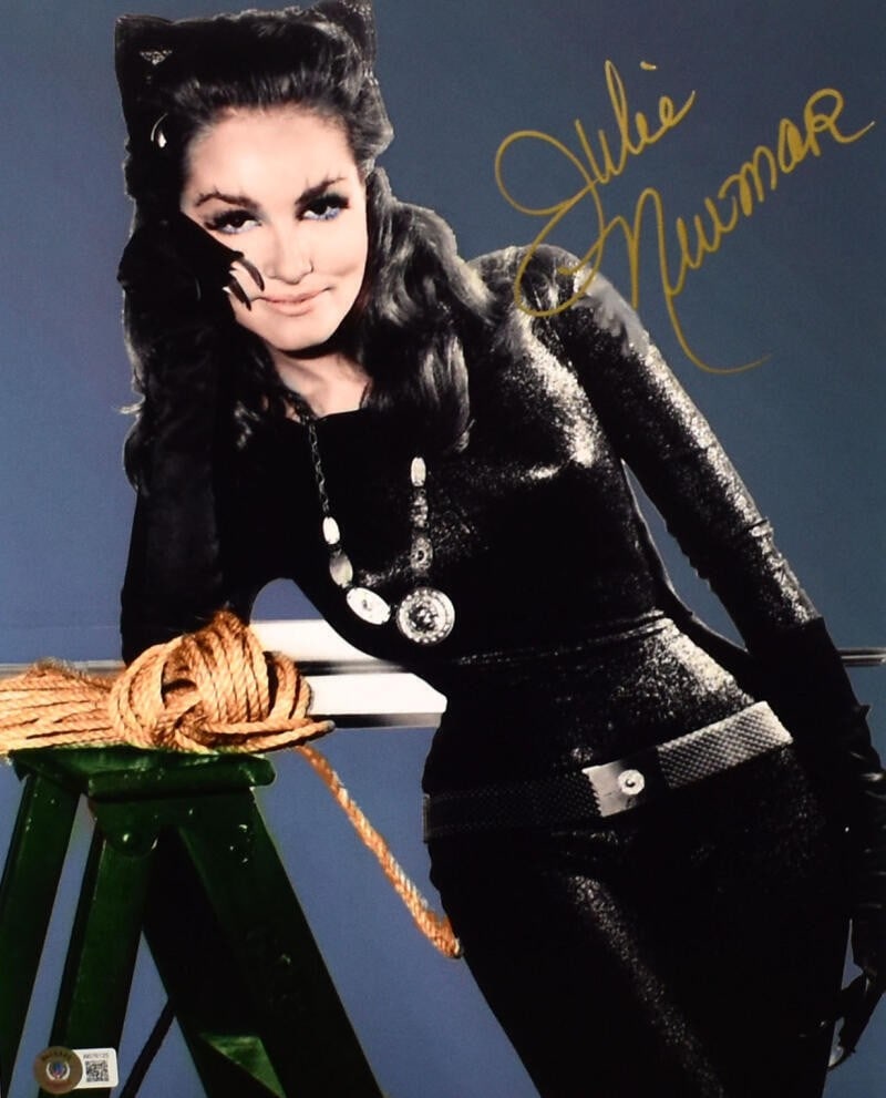 Julie Newmar Signed Catwoman 11x14 Photo Beckett Authenticated: Julie Newmar Signed Catwoman 11x14 Photo Beckett Authenticated This captivating 11x14 photograph features Julie Newmar as Catwoman, elegantly posed and autographed by the legendary actress herself. Th