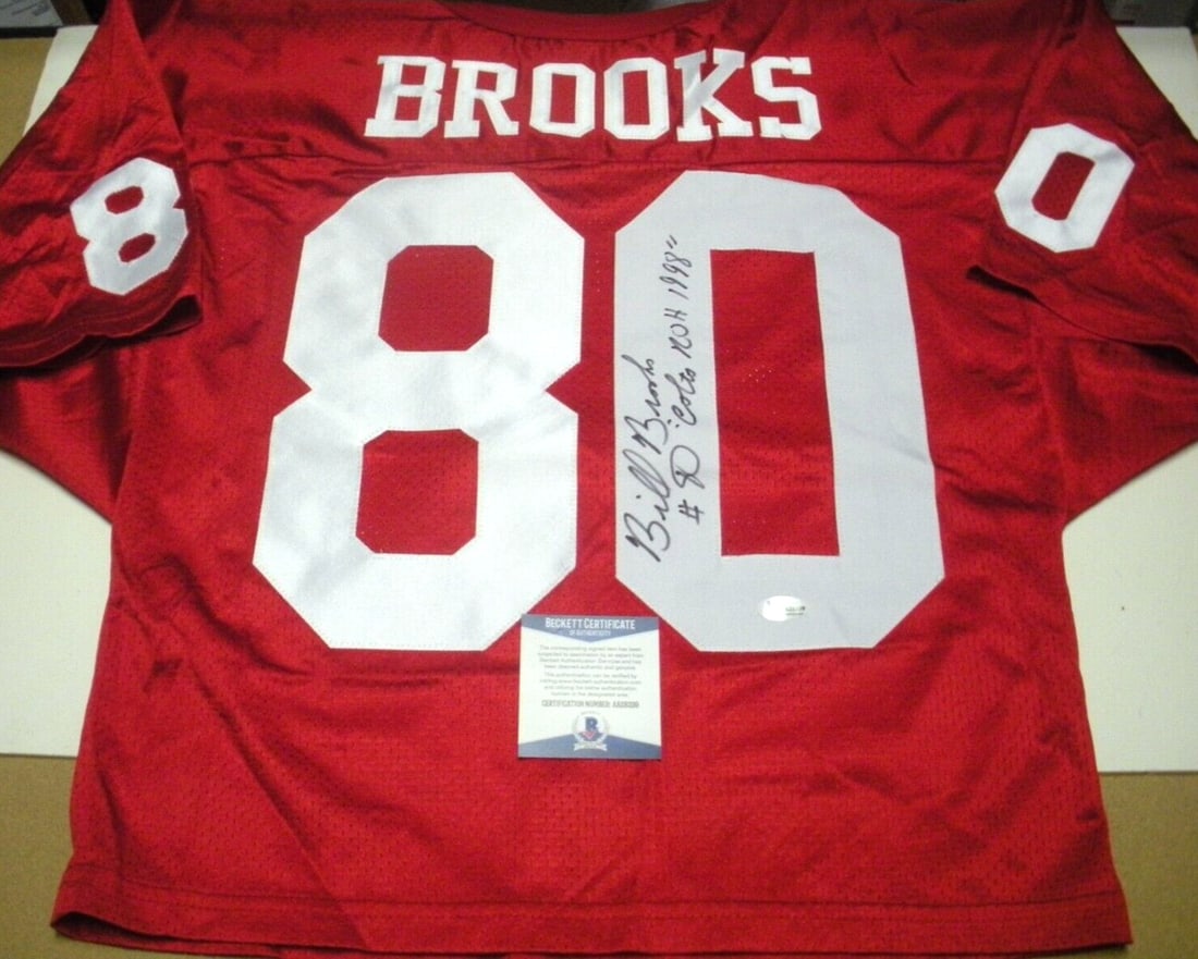 Signed Wilson Jersey Boston University Bill Brooks Beckett Certified: Signed Wilson Jersey Boston University Bill Brooks Beckett Certified This is an official licensed Wilson jersey signed by Bill Brooks of Boston University. The jersey comes with Beckett Certificate of