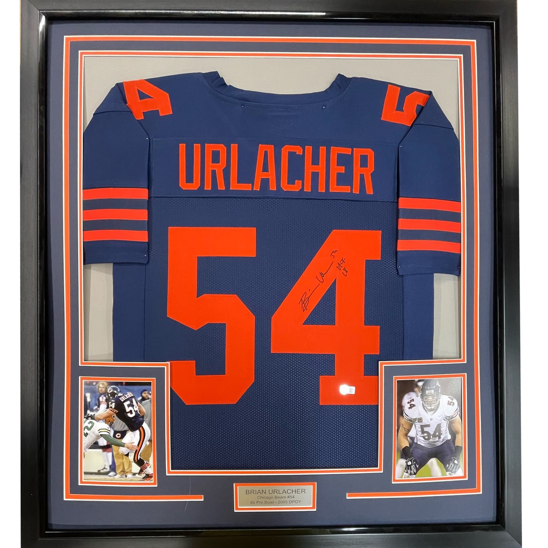 Framed Autographed Brian Urlacher Blue Retro Jersey HOF 18 BAS COA: Framed Autographed Brian Urlacher Blue Retro Jersey HOF 18 BAS COA This stunning framed autographed jersey features Brian Urlacher, the legendary NFL linebacker of the Chicago Bears. Measuring 33" x 4
