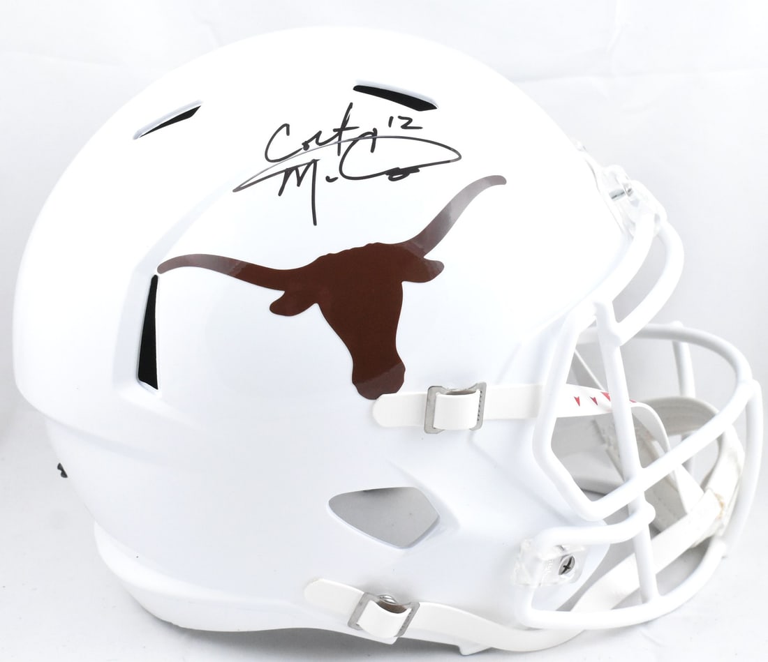 Full Size Texas Longhorns Helmet Signed by Colt McCoy Beckett W Authenticated: Full Size Texas Longhorns Helmet Signed by Colt McCoy Beckett W Authenticated This is a pre-owned full-size Texas Longhorns Speed helmet autographed by Colt McCoy. The helmet is an original item and c