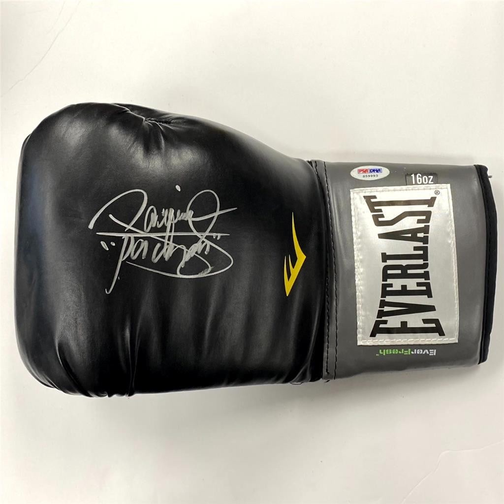 Manny Pacquiao autographed Everlast black boxing glove PSA: Manny Pacquiao autographed Everlast black boxing glove PSA This is a black Everlast boxing glove signed by Manny Pacquiao, also known as "Pacman." The autograph has been authenticated by Professional 