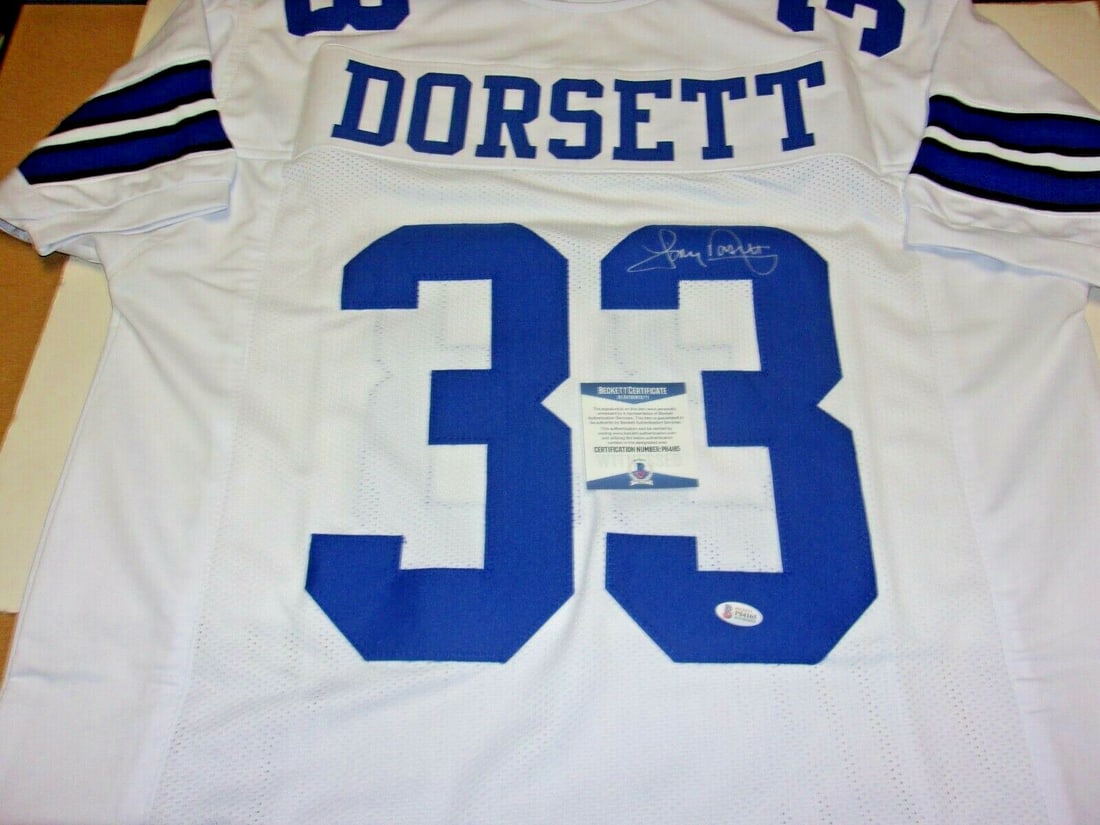 Tony Dorsett Signed Dallas Cowboys Jersey With Beckett COA HOF 94: Tony Dorsett Signed Dallas Cowboys Jersey With Beckett COA HOF 94 This is a Dallas Cowboys jersey signed by Hall of Famer Tony Dorsett. The autograph is an authentic original and the jersey comes with