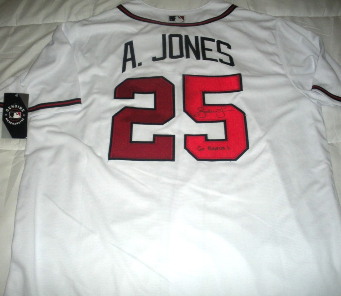 Autographed MLB Jersey Andruw Jones Braves With COA: Autographed MLB Jersey Andruw Jones Braves With COA This official licensed MLB jersey is signed by Andruw Jones of the Atlanta Braves. The jersey comes with a certificate of authenticity and is an ori