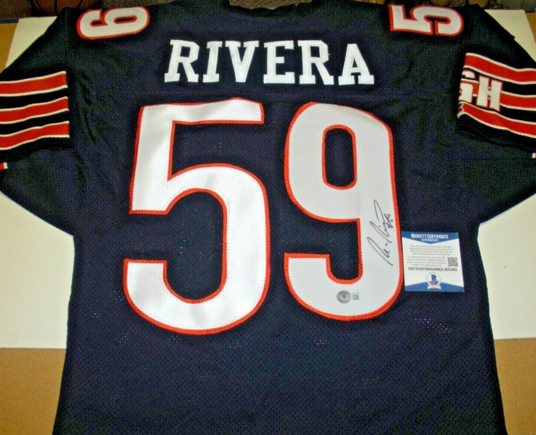 Signed Russell Jersey Ron Rivera Chicago Bears Beckett COA Authentic NFL: Signed Russell Jersey Ron Rivera Chicago Bears Beckett COA Authentic NFL This is a pre-owned, official licensed Russell jersey signed by Ron Rivera of the Chicago Bears. The jersey comes with Beckett/