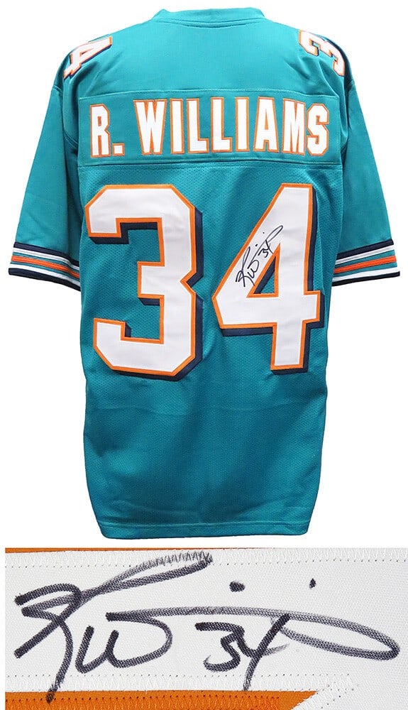 Ricky Williams Signed Teal Custom NFL Jersey with COA: Ricky Williams Signed Teal Custom NFL Jersey with COA This is a pre-owned teal custom football jersey signed by NFL star Ricky Williams. The jersey, featuring an XL size, is an original piece that com