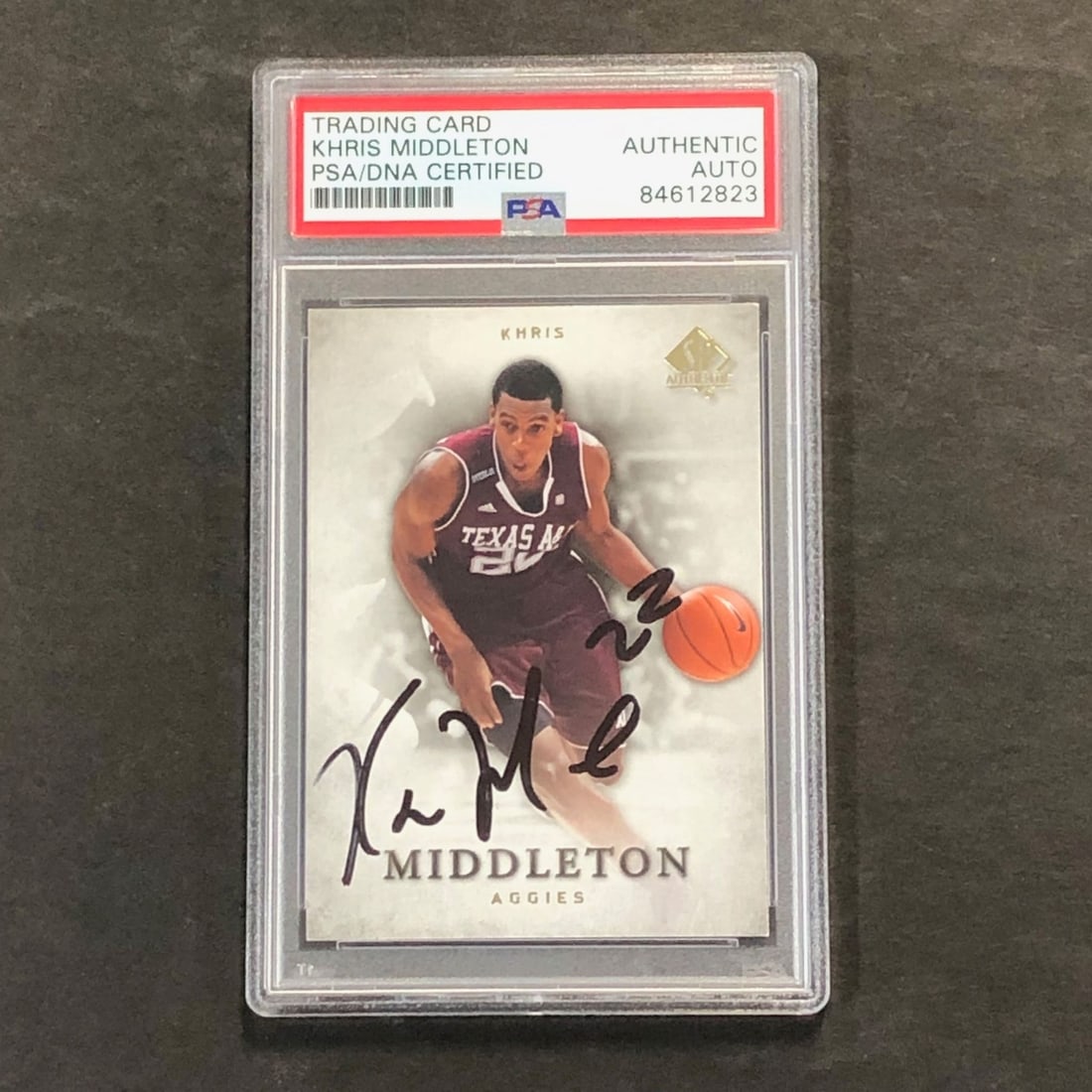 2012-13 Upper Deck SP Authentic #35 Khris Middleton Signed Card PSA/DNA: 2012-13 Upper Deck SP Authentic #35 Khris Middleton Signed Card PSA/DNA This is a 2012-13 Upper Deck SP Authentic #35 basketball card featuring the signature of Khris Middleton, a player for the Milwa
