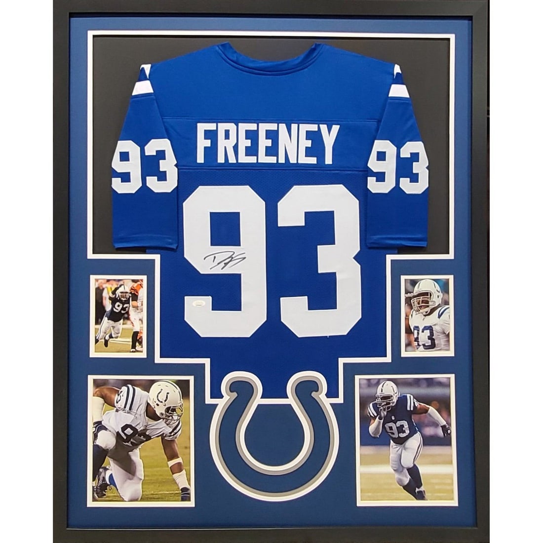 Framed Indianapolis Colts Jersey Signed by Dwight Freeney with JSA Authentication: Framed Indianapolis Colts Jersey Signed by Dwight Freeney with JSA Authentication This is a framed Indianapolis Colts jersey autographed by Dwight Freeney. The jersey is authenticated by JSA and featu