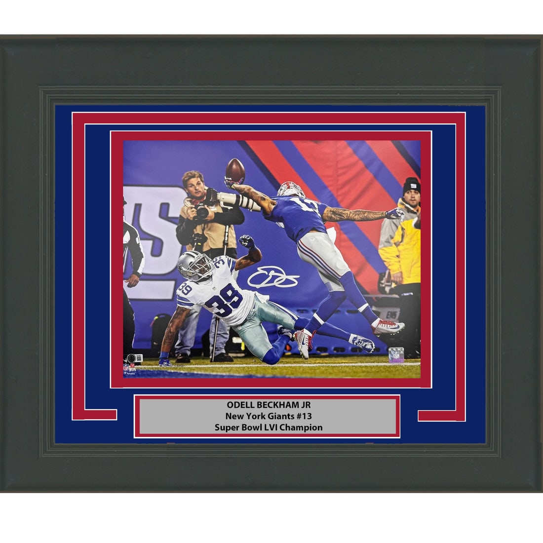 Framed Signed Odell Beckham Jr. The Catch 16x20 Photo JSA Authenticated: Framed Signed Odell Beckham Jr. The Catch 16x20 Photo JSA Authenticated This professionally framed and matted 16x20 photo captures Odell Beckham Jr. making his legendary catch for the New York Giants.