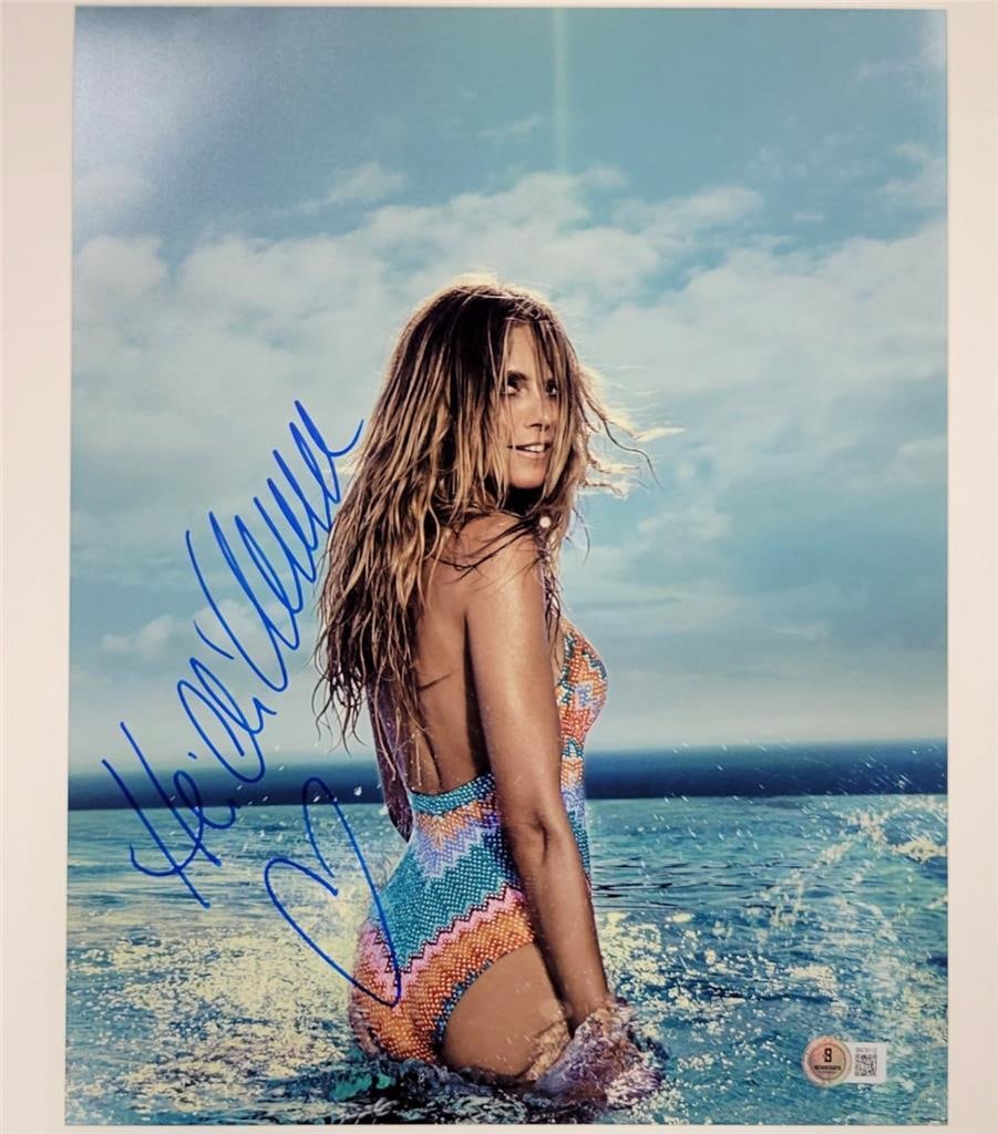 Heidi Klum Signed 11x14 Victoria's Secret Photo Beckett Authenticated: Heidi Klum Signed 11x14 Victoria's Secret Photo Beckett Authenticated This stunning 11x14 photograph captures Heidi Klum, the renowned Victoria's Secret model, in all her glory. An authentic autograph