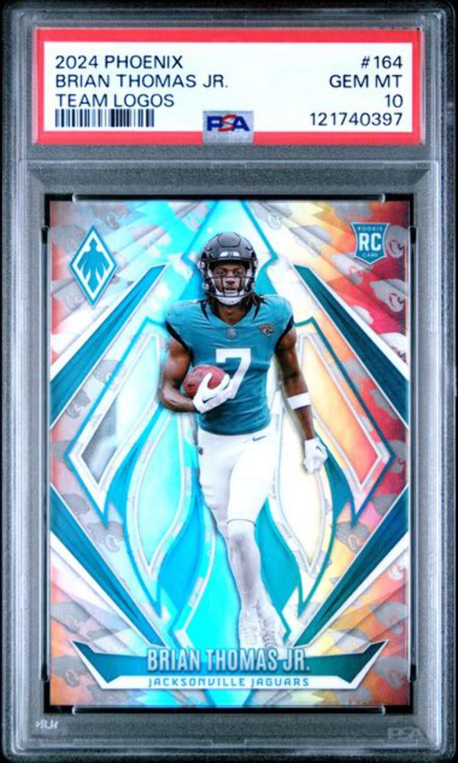 2024 Panini Phoenix Brian Thomas Jr Rookie Card #164 /299 PSA 10 NFL: 2024 Panini Phoenix Brian Thomas Jr Rookie Card #164 /299 PSA 10 NFL Discover the graded 2024 Panini Phoenix Brian Thomas Jr. #164/299 Logos Rookie RC Card, featuring an impressive PSA 10 grade. This 