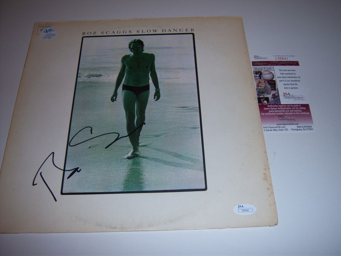 Signed Boz Scaggs Slow Dancer Vinyl Album with JSA Authentication: Signed Boz Scaggs Slow Dancer Vinyl Album with JSA Authentication This is a pre-owned original LP record album of "Slow Dancer" by Boz Scaggs, signed and authenticated with JSA/COA. The album originat