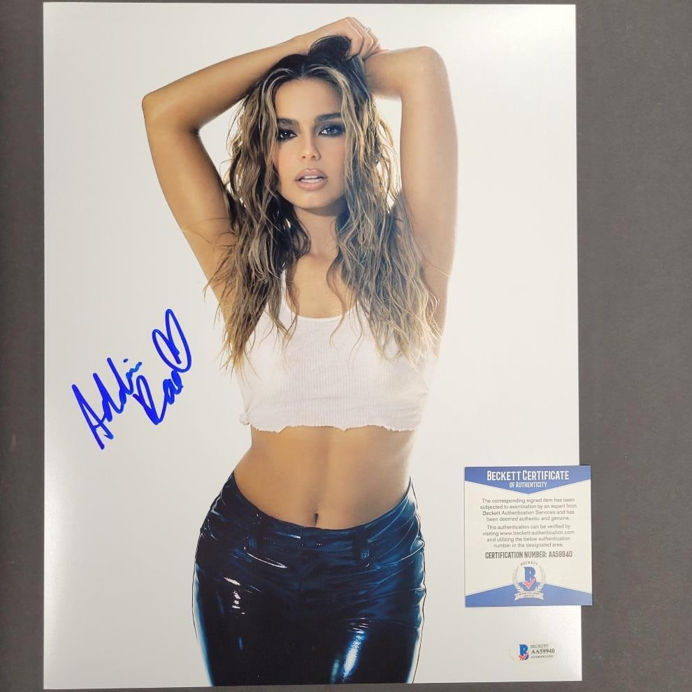 Addison Rae Signed 11x14 Photo TikTok Star Beckett Authenticated: Addison Rae Signed 11x14 Photo TikTok Star Beckett Authenticated Capture a piece of TikTok history with this authentic 11x14 photo signed by TikTok star Addison Rae. This original photograph showcases