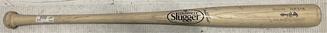 Los Angeles Dodgers Hanley Ramirez Team Issued Baseball Bat: Los Angeles Dodgers Hanley Ramirez Team Issued Baseball Bat This is a team-issued Louisville Slugger baseball bat associated with Hanley Ramirez and the Los Angeles Dodgers. The bat shows signs of wea