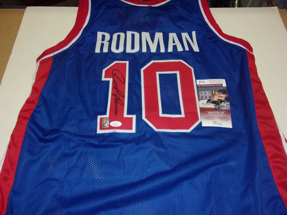 Autographed Dennis Rodman Basketball Jersey JSA COA Detroit Pistons Chicago Bulls: Autographed Dennis Rodman Basketball Jersey JSA COA Detroit Pistons Chicago Bulls This is a pre-owned basketball jersey signed by Dennis Rodman, notable for his achievements with the Detroit Pistons a