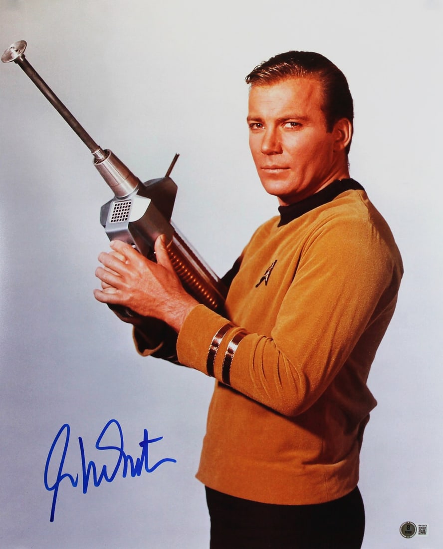 William Shatner Signed Star Trek Captain Kirk 16x20 Photo BAS Authenticated: William Shatner Signed Star Trek Captain Kirk 16x20 Photo BAS Authenticated This stunning 16x20 vertical photograph captures Captain Kirk, personally signed by the legendary William Shatner, star of S