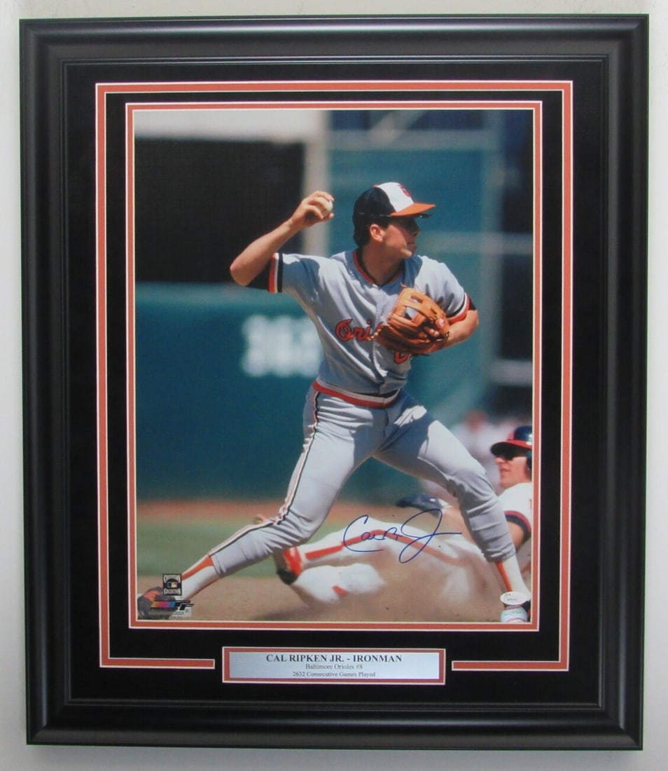 Cal Ripken Jr. Signed Framed 16x20 Orioles Photo JSA Authenticated: Cal Ripken Jr. Signed Framed 16x20 Orioles Photo JSA Authenticated Celebrate baseball history with this signed Cal Ripken Jr. 16x20 photo, beautifully framed for display. This original photograph feat
