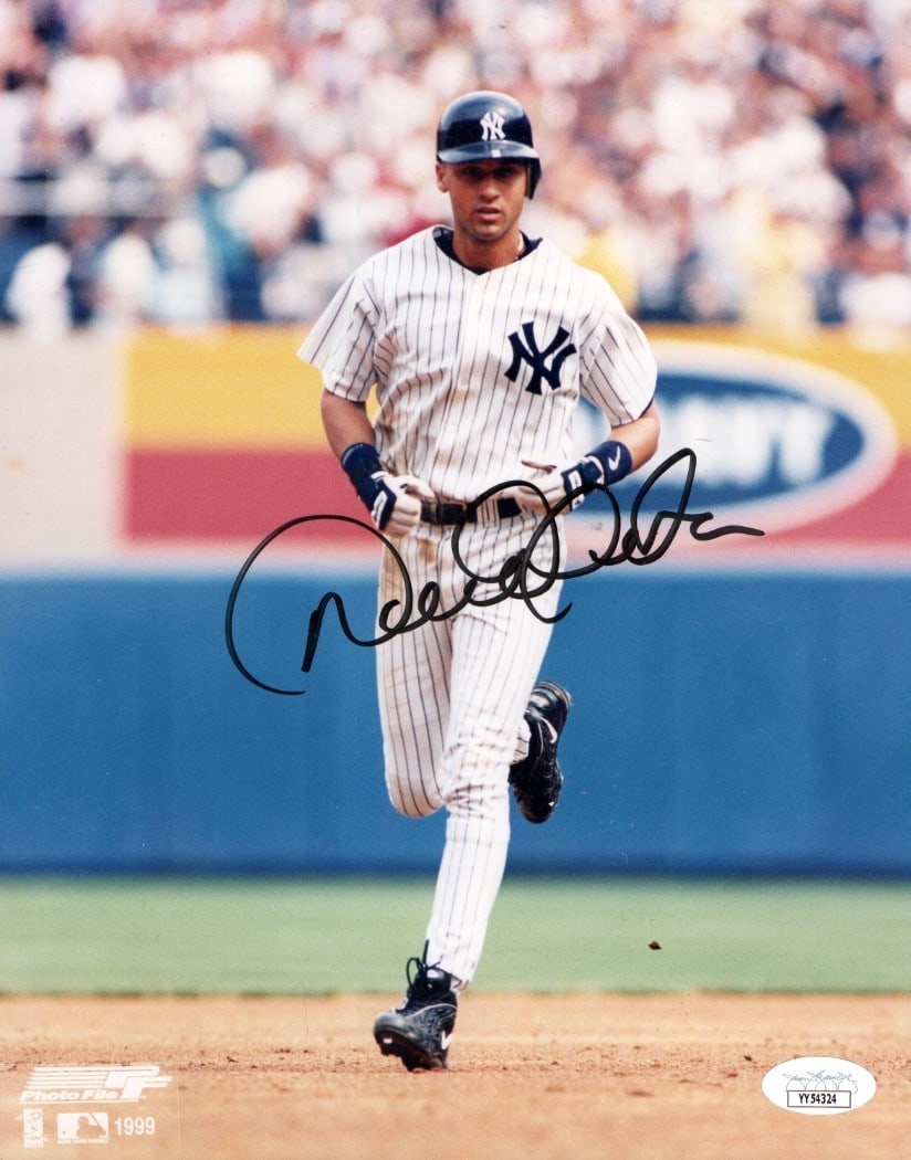 Derek Jeter Autographed 8x10 Yankees Photo 1999 HR JSA Authenticated: Derek Jeter Autographed 8x10 Yankees Photo 1999 HR JSA Authenticated This is an original 8X10 photo autographed by baseball legend Derek Jeter, capturing his iconic home run trot from the 1999 season 