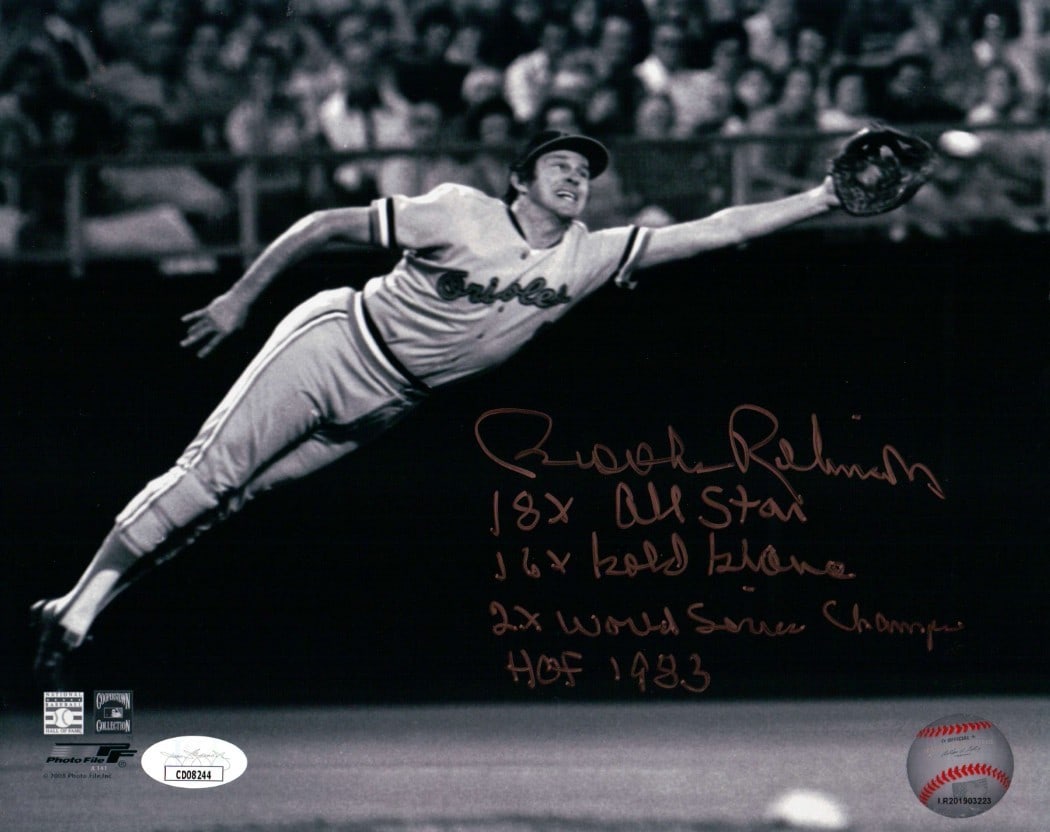 Brooks Robinson Autographed 8X10 B/W Photo Orioles JSA Inscribed Stats: Brooks Robinson Autographed 8X10 B/W Photo Orioles JSA Inscribed Stats This is an original 8x10 black and white photograph of Brooks Robinson, a legendary player for the Baltimore Orioles. The photo i