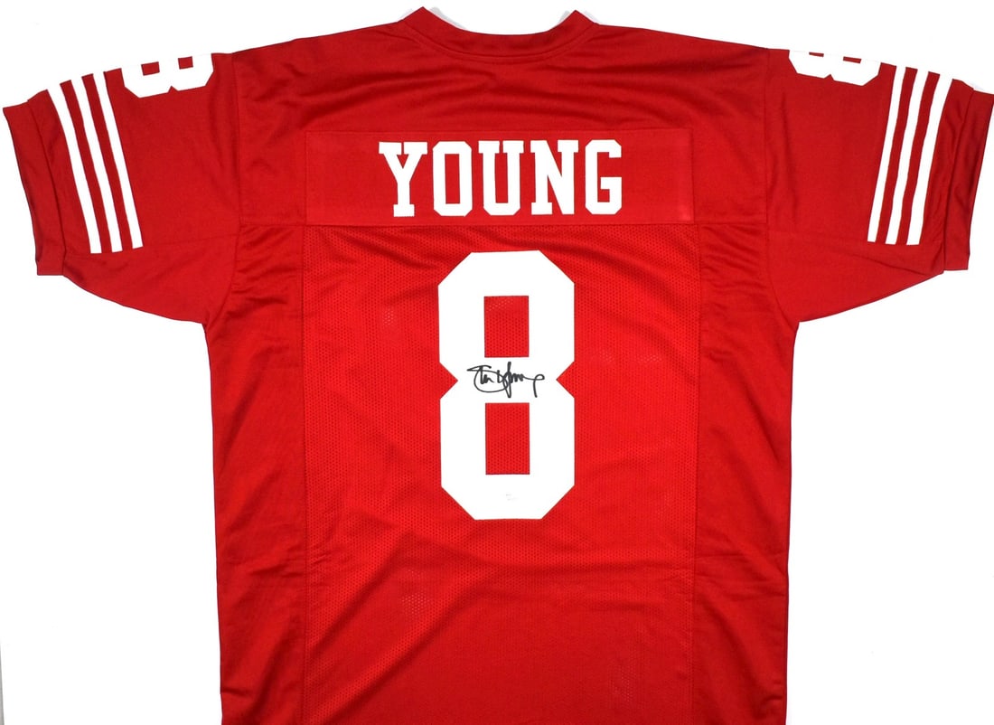 Signed Steve Young Red San Francisco 49ers Jersey JSA Authenticated: Signed Steve Young Red San Francisco 49ers Jersey JSA Authenticated This red pro style jersey is autographed by Steve Young, renowned quarterback of the San Francisco 49ers. The jersey is an original 